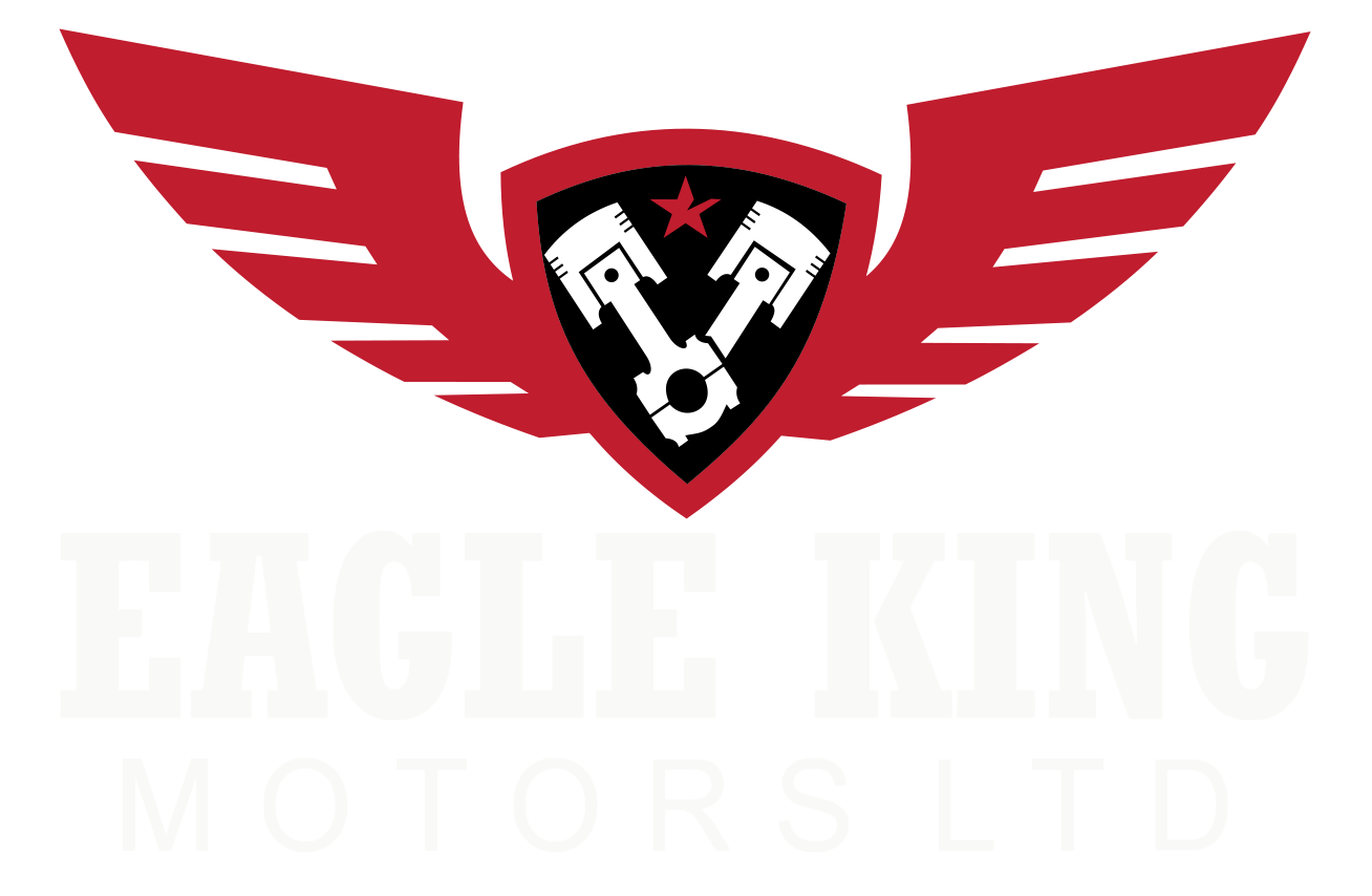 Eagle King Motors and Tire Shop logo featuring red wings and a shield with engine pistons and red star, Abbotsford automotive service emblem