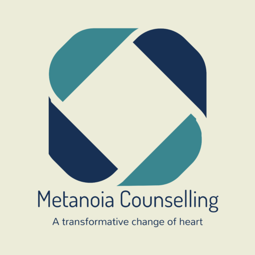 Metanoia Counselling logo featuring a geometric diamond shape in teal and navy blue with the tagline 'A transformative change of heart' - counselling services in Abbotsford
