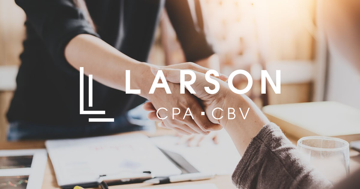 Larson CPA CBV team members collaborating during a business meeting in Abbotsford