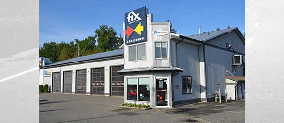 FIX AUTO Abbotsford East auto body repair shop exterior with blue and gray storefront and service bays