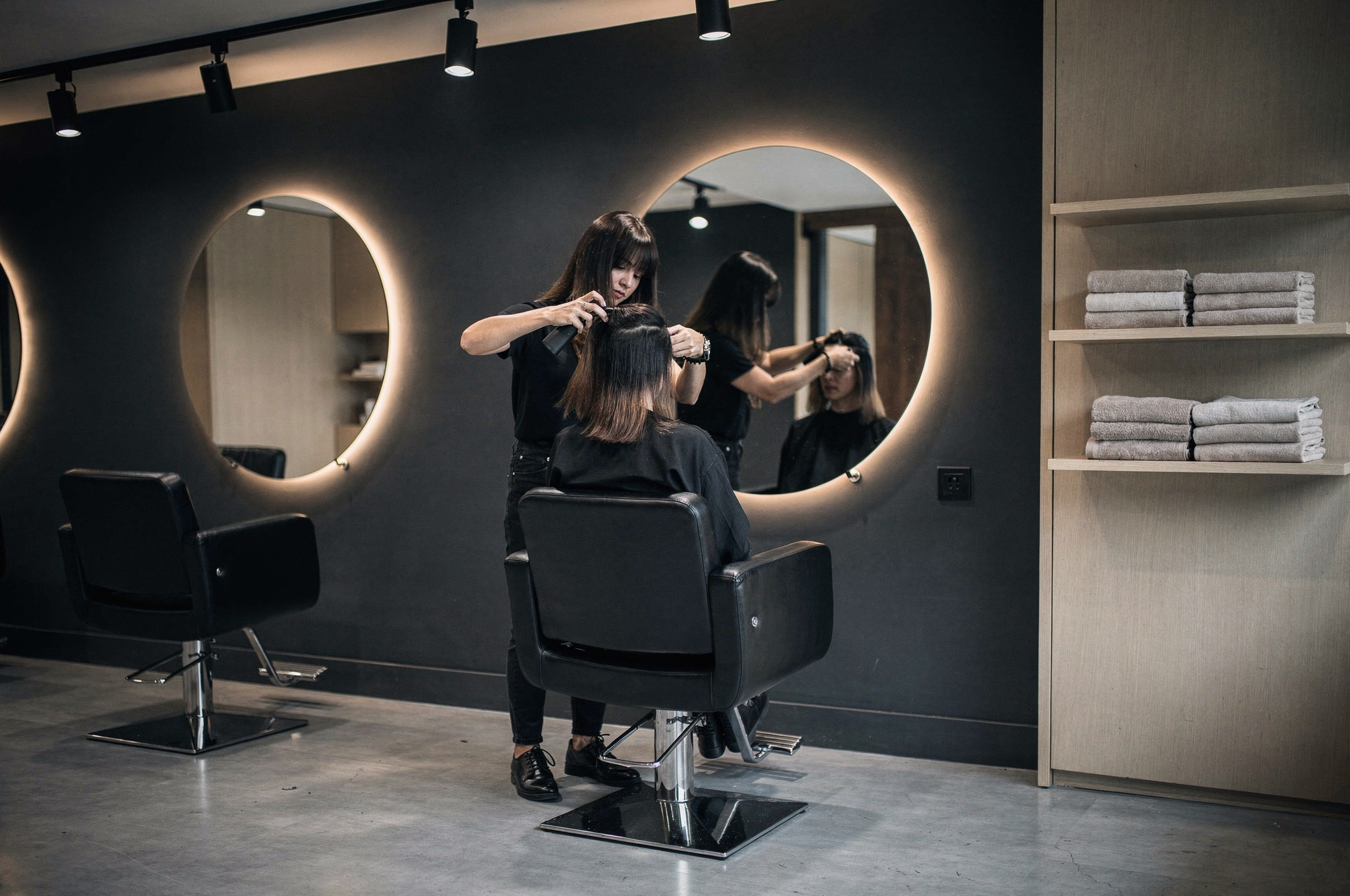 Barcode Hair Studio on South Fraser Way with sleek colour stations and bright mirrors